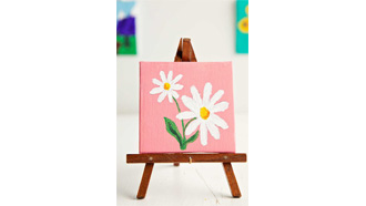 Tiny canvas on easel